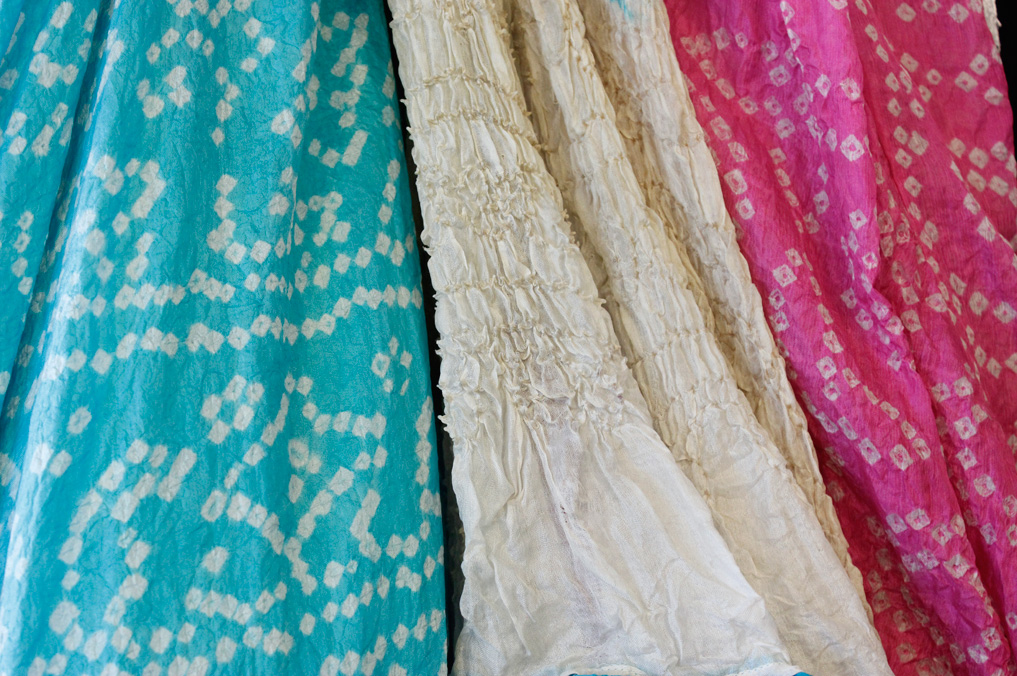 silk bandhini - in this process, fabric is tied and dyed, resulting in beautiful patterns.